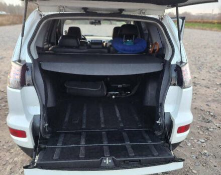 Білий Міцубісі Аутлендер ХЛ, об'ємом двигуна 2.36 л та пробігом 124 тис. км за 11300 $, фото 15 на Automoto.ua