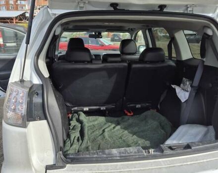 Мицубиси Аутлендер ХЛ 2011 в Киеве на Automoto.ua Белый Мицубиси Аутлендер ХЛ, объемом двигателя 2.18 л и пробегом 142 тыс. км за 14000 $, фото 10 на Automoto.ua