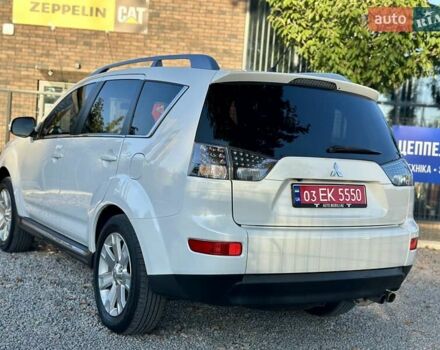 Мицубиси Аутлендер ХЛ 2011 в Виннице на Automoto.ua Белый Мицубиси Аутлендер ХЛ, объемом двигателя 2 л и пробегом 225 тыс. км за 10999 $, фото 11 на Automoto.ua