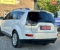 Мицубиси Аутлендер ХЛ 2011 в Виннице на Automoto.ua Белый Мицубиси Аутлендер ХЛ, объемом двигателя 2 л и пробегом 225 тыс. км за 10999 $, фото 11 на Automoto.ua