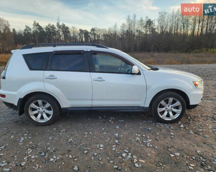 Білий Міцубісі Аутлендер ХЛ, об'ємом двигуна 2.36 л та пробігом 124 тис. км за 11300 $, фото 5 на Automoto.ua