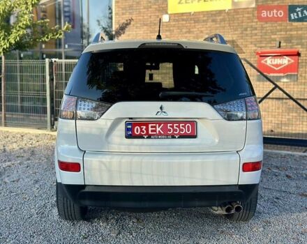 Мицубиси Аутлендер ХЛ 2011 в Виннице на Automoto.ua Белый Мицубиси Аутлендер ХЛ, объемом двигателя 2 л и пробегом 225 тыс. км за 10999 $, фото 12 на Automoto.ua