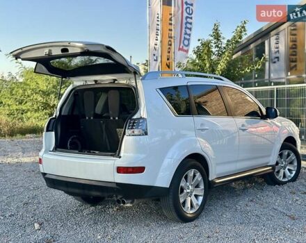 Мицубиси Аутлендер ХЛ 2011 в Виннице на Automoto.ua Белый Мицубиси Аутлендер ХЛ, объемом двигателя 2 л и пробегом 225 тыс. км за 10999 $, фото 22 на Automoto.ua