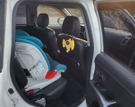 Білий Міцубісі Аутлендер ХЛ, об'ємом двигуна 2.36 л та пробігом 124 тис. км за 11300 $, фото 13 на Automoto.ua