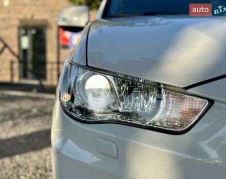 Мицубиси Аутлендер ХЛ 2011 в Виннице на Automoto.ua Белый Мицубиси Аутлендер ХЛ, объемом двигателя 2 л и пробегом 225 тыс. км за 10999 $, фото 5 на Automoto.ua