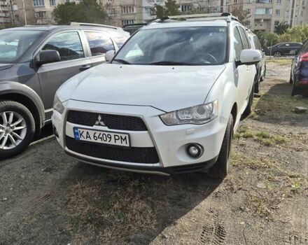 Мицубиси Аутлендер ХЛ 2011 в Киеве на Automoto.ua Белый Мицубиси Аутлендер ХЛ, объемом двигателя 2.18 л и пробегом 142 тыс. км за 14000 $, фото 11 на Automoto.ua