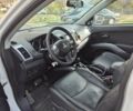 Мицубиси Аутлендер ХЛ 2011 в Киеве на Automoto.ua Белый Мицубиси Аутлендер ХЛ, объемом двигателя 2.18 л и пробегом 142 тыс. км за 14000 $, фото 5 на Automoto.ua