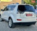 Мицубиси Аутлендер ХЛ 2011 в Виннице на Automoto.ua Белый Мицубиси Аутлендер ХЛ, объемом двигателя 2 л и пробегом 225 тыс. км за 10999 $, фото 18 на Automoto.ua