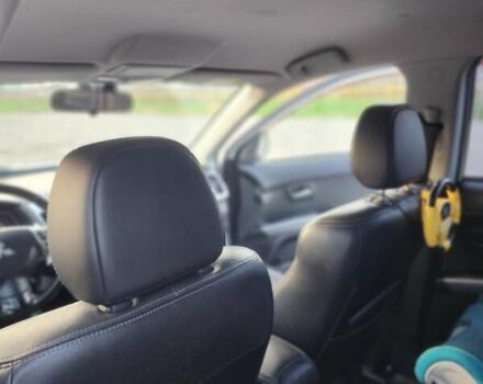 Білий Міцубісі Аутлендер ХЛ, об'ємом двигуна 2.36 л та пробігом 124 тис. км за 11300 $, фото 18 на Automoto.ua