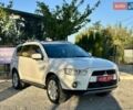Мицубиси Аутлендер ХЛ 2011 в Виннице на Automoto.ua Белый Мицубиси Аутлендер ХЛ, объемом двигателя 2 л и пробегом 225 тыс. км за 10999 $, фото 8 на Automoto.ua