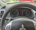 Мицубиси Аутлендер ХЛ 2011 в Киеве на Automoto.ua Белый Мицубиси Аутлендер ХЛ, объемом двигателя 2.18 л и пробегом 142 тыс. км за 14000 $, фото 4 на Automoto.ua