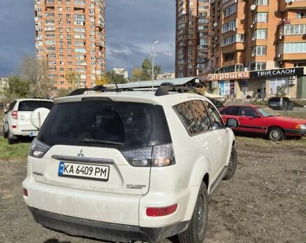 Мицубиси Аутлендер ХЛ 2011 в Киеве на Automoto.ua Белый Мицубиси Аутлендер ХЛ, объемом двигателя 2.18 л и пробегом 142 тыс. км за 14000 $, фото 3 на Automoto.ua