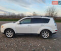 Білий Міцубісі Аутлендер ХЛ, об'ємом двигуна 2.36 л та пробігом 124 тис. км за 11300 $, фото 9 на Automoto.ua