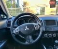 Мицубиси Аутлендер ХЛ 2011 в Виннице на Automoto.ua Белый Мицубиси Аутлендер ХЛ, объемом двигателя 2 л и пробегом 225 тыс. км за 10999 $, фото 32 на Automoto.ua