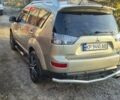 Бежевый Мицубиси Аутлендер ХЛ, объемом двигателя 3 л и пробегом 295 тыс. км за 9600 $, фото 2 на Automoto.ua