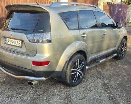 Бежевый Мицубиси Аутлендер ХЛ, объемом двигателя 3 л и пробегом 295 тыс. км за 9600 $, фото 3 на Automoto.ua