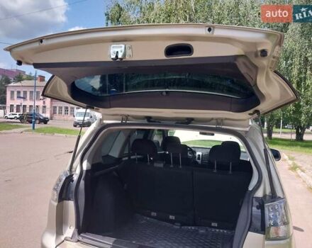 Бежевый Мицубиси Аутлендер ХЛ, объемом двигателя 2.4 л и пробегом 275 тыс. км за 8600 $, фото 38 на Automoto.ua