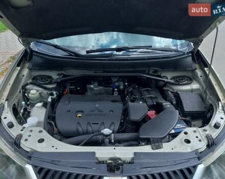 Бежевый Мицубиси Аутлендер ХЛ, объемом двигателя 2.4 л и пробегом 275 тыс. км за 8600 $, фото 28 на Automoto.ua