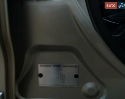 Бежевый Мицубиси Аутлендер ХЛ, объемом двигателя 2.4 л и пробегом 275 тыс. км за 8600 $, фото 30 на Automoto.ua