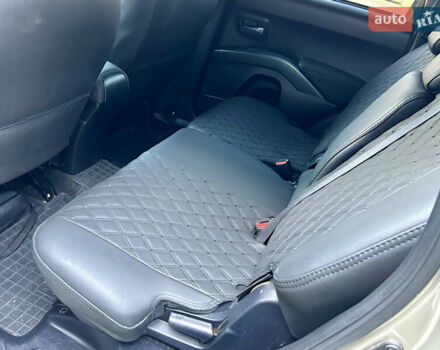 Бежевый Мицубиси Аутлендер ХЛ, объемом двигателя 2 л и пробегом 226 тыс. км за 8999 $, фото 20 на Automoto.ua