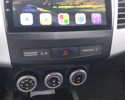 Бежевый Мицубиси Аутлендер ХЛ, объемом двигателя 2.4 л и пробегом 275 тыс. км за 8600 $, фото 40 на Automoto.ua