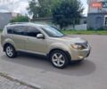 Бежевый Мицубиси Аутлендер ХЛ, объемом двигателя 2.4 л и пробегом 275 тыс. км за 8600 $, фото 2 на Automoto.ua