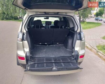 Бежевый Мицубиси Аутлендер ХЛ, объемом двигателя 2.4 л и пробегом 275 тыс. км за 8600 $, фото 36 на Automoto.ua