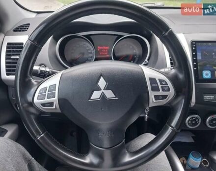 Бежевый Мицубиси Аутлендер ХЛ, объемом двигателя 2.4 л и пробегом 275 тыс. км за 8600 $, фото 24 на Automoto.ua