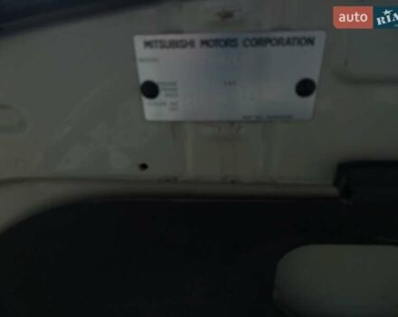 Бежевый Мицубиси Аутлендер ХЛ, объемом двигателя 2.4 л и пробегом 275 тыс. км за 8600 $, фото 31 на Automoto.ua