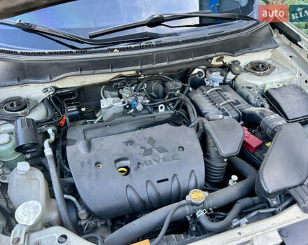 Бежевый Мицубиси Аутлендер ХЛ, объемом двигателя 2 л и пробегом 226 тыс. км за 8999 $, фото 43 на Automoto.ua