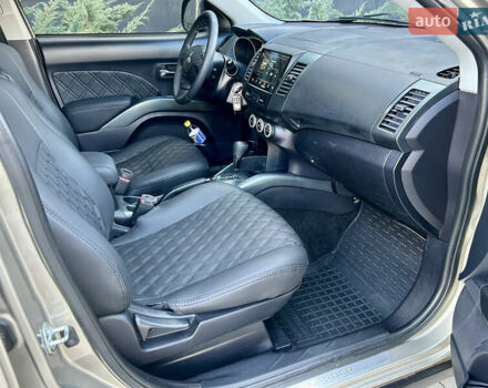 Бежевый Мицубиси Аутлендер ХЛ, объемом двигателя 2 л и пробегом 226 тыс. км за 8999 $, фото 26 на Automoto.ua