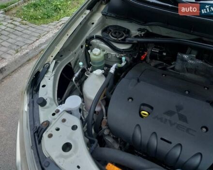 Бежевый Мицубиси Аутлендер ХЛ, объемом двигателя 2.4 л и пробегом 275 тыс. км за 8600 $, фото 29 на Automoto.ua