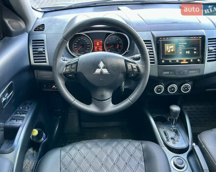 Бежевый Мицубиси Аутлендер ХЛ, объемом двигателя 2 л и пробегом 226 тыс. км за 8999 $, фото 21 на Automoto.ua