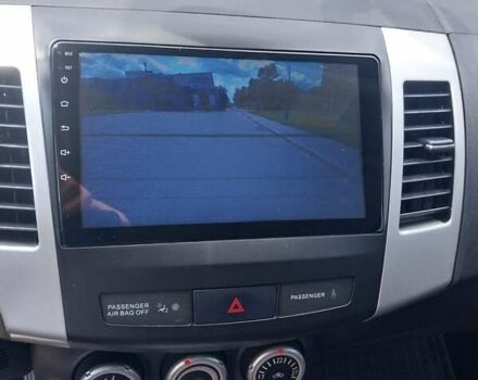 Бежевый Мицубиси Аутлендер ХЛ, объемом двигателя 2.4 л и пробегом 275 тыс. км за 8600 $, фото 19 на Automoto.ua