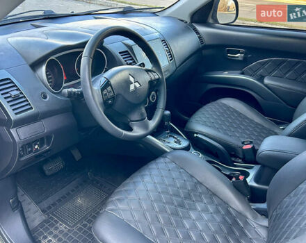 Бежевый Мицубиси Аутлендер ХЛ, объемом двигателя 2 л и пробегом 226 тыс. км за 8999 $, фото 16 на Automoto.ua