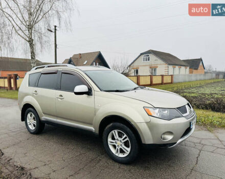 Бежевый Мицубиси Аутлендер ХЛ, объемом двигателя 2.4 л и пробегом 107 тыс. км за 9900 $, фото 1 на Automoto.ua