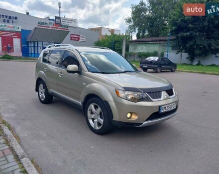 Бежевий Міцубісі Аутлендер ХЛ, об'ємом двигуна 2.4 л та пробігом 275 тис. км за 8600 $, фото 1 на Automoto.ua