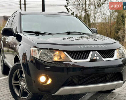 Чорний Міцубісі Аутлендер ХЛ, об'ємом двигуна 2 л та пробігом 222 тис. км за 10300 $, фото 1 на Automoto.ua