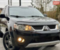 Чорний Міцубісі Аутлендер ХЛ, об'ємом двигуна 2 л та пробігом 222 тис. км за 10300 $, фото 1 на Automoto.ua