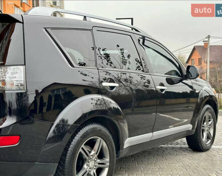 Чорний Міцубісі Аутлендер ХЛ, об'ємом двигуна 2 л та пробігом 222 тис. км за 10300 $, фото 3 на Automoto.ua