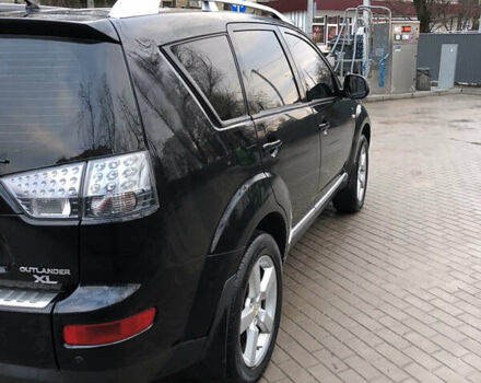 Черный Мицубиси Аутлендер ХЛ, объемом двигателя 3 л и пробегом 207 тыс. км за 9300 $, фото 6 на Automoto.ua