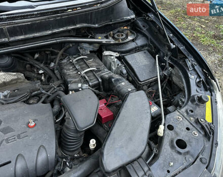 Чорний Міцубісі Аутлендер ХЛ, об'ємом двигуна 2.4 л та пробігом 283 тис. км за 8900 $, фото 31 на Automoto.ua