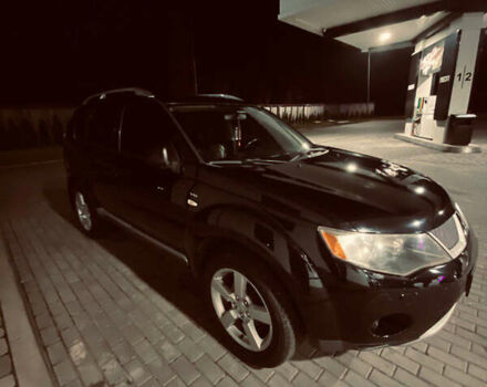 Черный Мицубиси Аутлендер ХЛ, объемом двигателя 3 л и пробегом 253 тыс. км за 9800 $, фото 2 на Automoto.ua