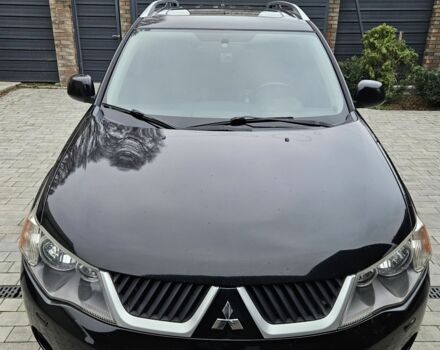 Чорний Міцубісі Аутлендер ХЛ, об'ємом двигуна 3 л та пробігом 238 тис. км за 10800 $, фото 7 на Automoto.ua