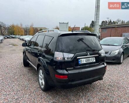 Черный Мицубиси Аутлендер ХЛ, объемом двигателя 3 л и пробегом 245 тыс. км за 9300 $, фото 3 на Automoto.ua