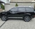 Чорний Міцубісі Аутлендер ХЛ, об'ємом двигуна 3 л та пробігом 238 тис. км за 10800 $, фото 2 на Automoto.ua