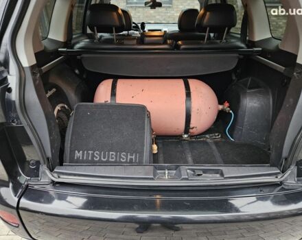 Чорний Міцубісі Аутлендер ХЛ, об'ємом двигуна 3 л та пробігом 238 тис. км за 10800 $, фото 16 на Automoto.ua