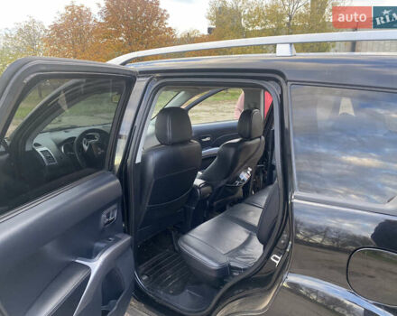 Черный Мицубиси Аутлендер ХЛ, объемом двигателя 1.97 л и пробегом 207 тыс. км за 8200 $, фото 7 на Automoto.ua