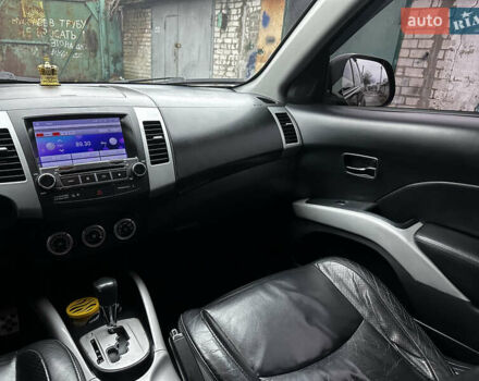 Черный Мицубиси Аутлендер ХЛ, объемом двигателя 2.4 л и пробегом 283 тыс. км за 8900 $, фото 22 на Automoto.ua