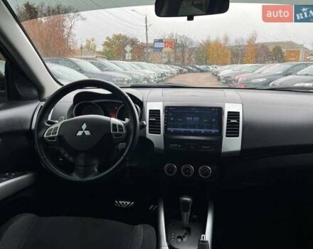Черный Мицубиси Аутлендер ХЛ, объемом двигателя 3 л и пробегом 245 тыс. км за 9300 $, фото 1 на Automoto.ua